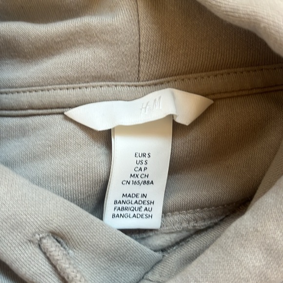 This is a grayish tan hoodie from H&M size women's small - Picture 3 of 4